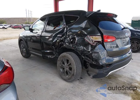 2014 Hyundai Santa Fe Sport 2.4L z USA, uszkodzony, nr VIN 5XYZU3LB4EG164976